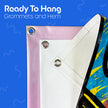 Vinyl banner with grommets and hem on a blue background with text 'Ready To Hang Grommets and Hem'.
