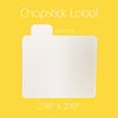 White label with tab on a yellow background, labeled 'Chapstick Label with tab'.