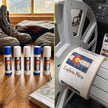 Collection of Colorado-themed products including lip balms and a printing machine.