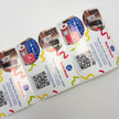 rectangle labels on a roll with a thank you for order design and qr code on a white background