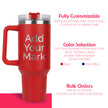 Red travel mug with customizable text on a white background