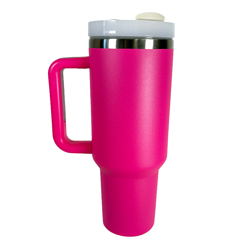Pink travel mug with a white lid on a white background