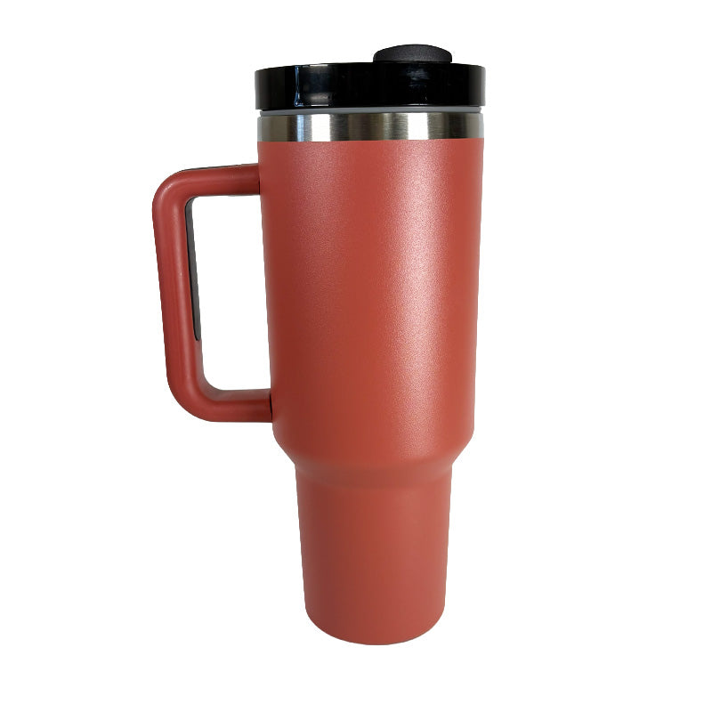Red travel mug with a black lid on a white background