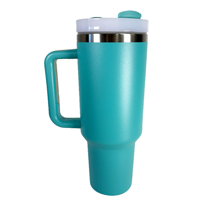 Turquoise travel mug with a handle on a white background