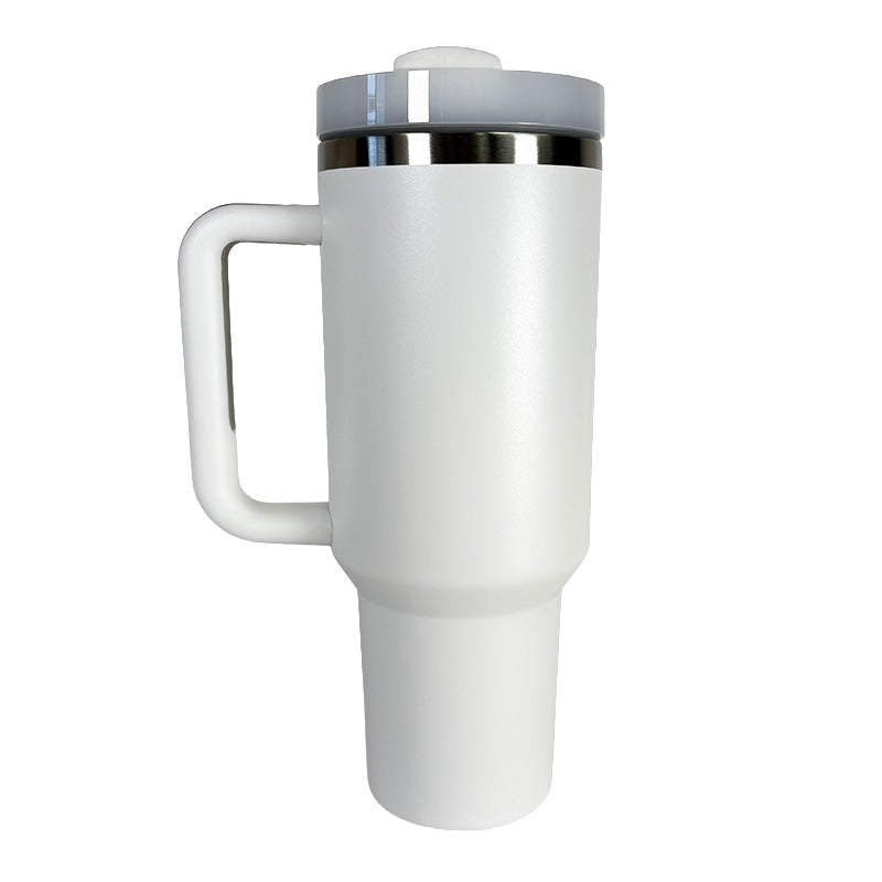 White travel mug with a silver lid on a white background