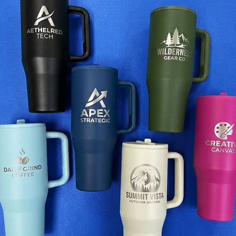 Collection of engraved tumblers on a blue background
