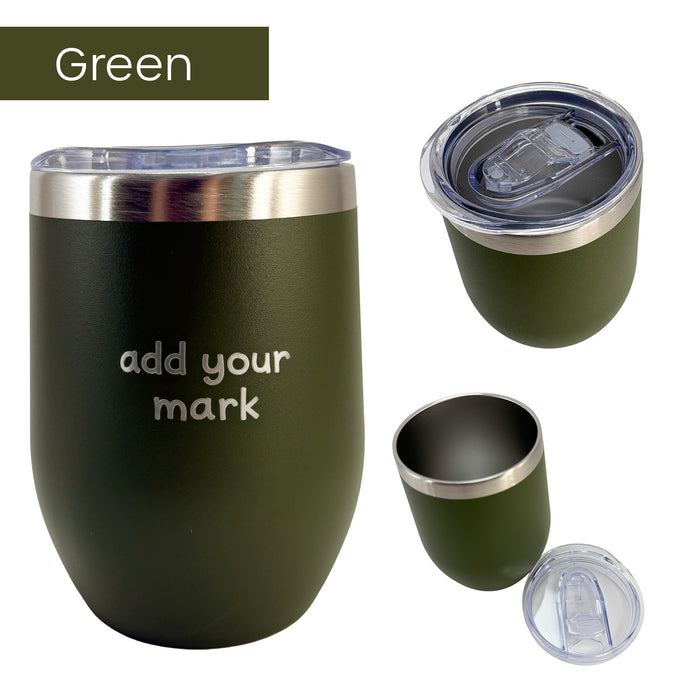 Green insulated tumbler with silver lid on a white background